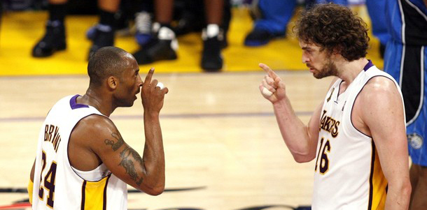 Kobe Bryant and teammate Pau Gasol of the Los Angeles Lakers celebrate after Gasol scored during Game 2 of the NBA Finals in Los Angeles