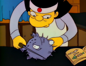 Assistant sushi chef cutting fugu in The Simpsons
