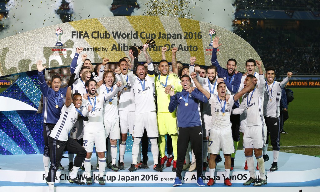 Real Madrid celebrate winning the FIFA Club World Cup Final with the trophy